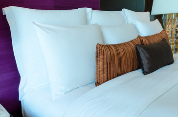 Colorful Pillow on bed and decoration.
