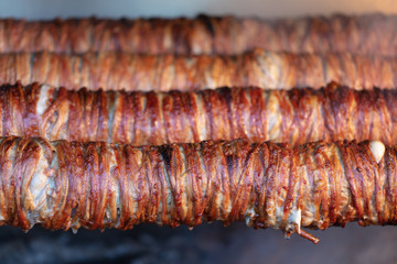 Turkish traditional food Kokorec roasting on the fire