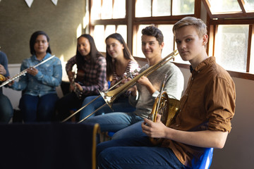 Teenage musicians rehearsing