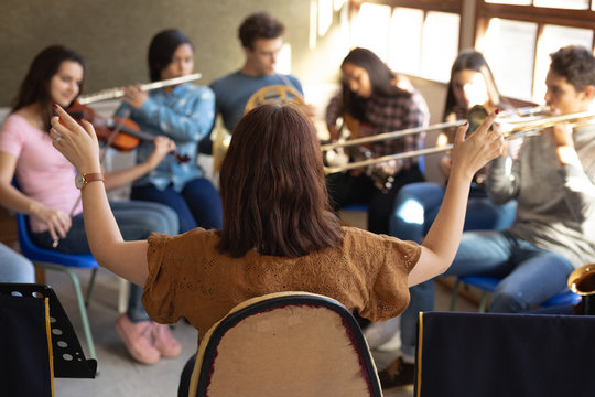 Teenage musicians rehearsing