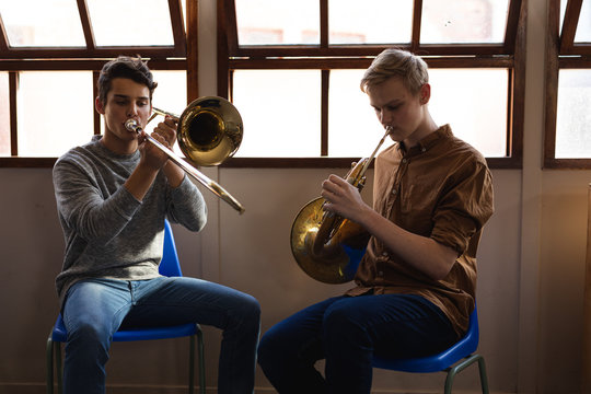 Teenage musicians rehearsing