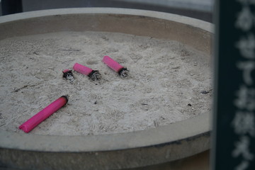 some red burned incense sticks