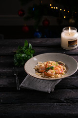 prawns and pasta in a large bowl, dinner, Valentines day, dark wooden backdrop