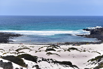 White sands of Caleta del Mojon Blanco in Lanzarote Island, Canary Islands, Spain