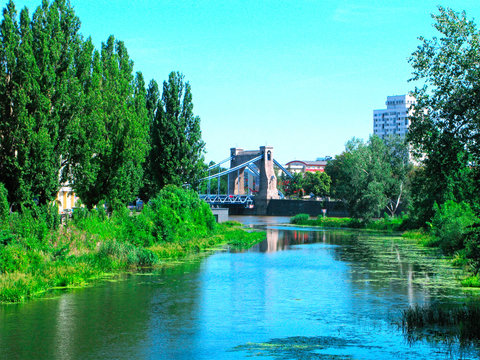 Poland. Cityscape of Wroclaw city with the Grunwaldzki bridge and the confluence of the Oder and Olawa rivers.