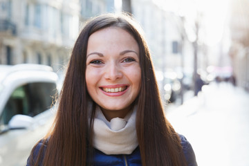 Portrait of cheerful young woman in the  jacket