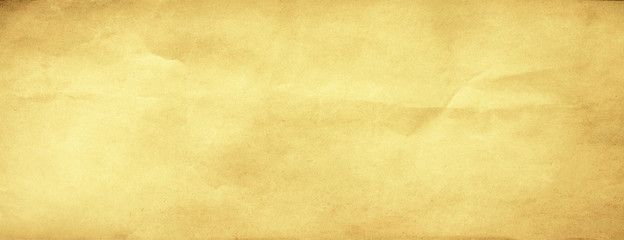 Texture of old yellow paper with copy space for text or image.Vintage background.Panoramic long format.