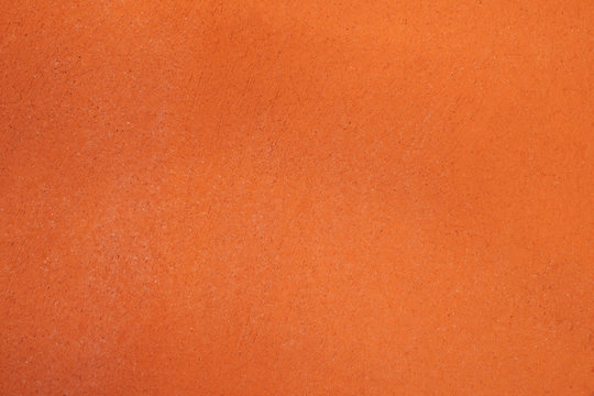Terracotta modern grainy stucco texture. Clay textured background.