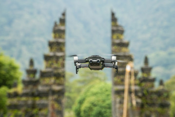 Drone flying over Handara Gates - popular architechtural and spiritual attraction on Bali, Indonesia