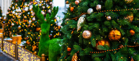 Christmas lights, Christmas decorations on the street. Blurred background city street with Christmas illuminations. Copy space for your text.