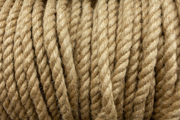 Fototapeta na wymiar Rope. Background of jute rope on a reel close-up.