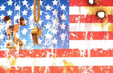 whistle-blower concept with USA flag and golden whistle