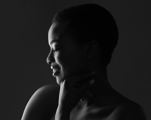 Black and white profile portrait of beautiful afro woman