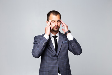 Handsome business man thinking over white background