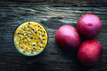 Fresh red passion fruit juice delicious sweet and sour in top view