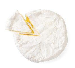 Cheese with white mold, cut a triangle on a white background. The view of top.