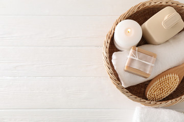 Composition with spa supplies on white wooden background, copy space