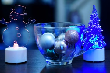 Christmas ball on abstract colored background.