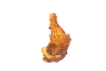 A hong kong-style grilled chicken leg stands alone on a white background