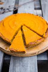 Pumpkin yellow tart, casserole or pie. Homemade vegan or vegetarian dessert.