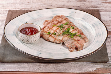 restaurant dish on white and gray plates, on a table