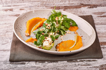 restaurant dish on white and gray plates, on a table