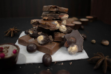 Dark and milk chokolate on the black background