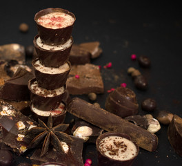 Dark and milk chokolate on the black background