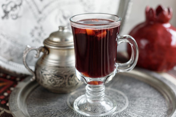 Warm Pomegranate Mulled Wine with Honey. Winter Beverage.