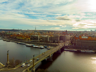 Fototapeta na wymiar Aerial Panoramic View over The Prague City, River, Bridges and Old Town, Czech Republic