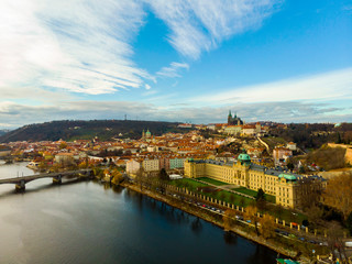 Obraz premium Aerial Panoramic View over The Prague City, River, Bridges, Castle and Old Town, Czech Republic