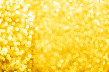 Romantic dreamy golden bokeh light background.