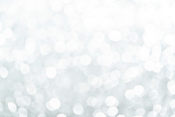 silver and white bokeh lights defocused.