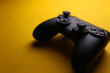 game joystick on a yellow background © Дмитрий Усык