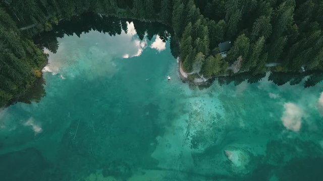 Top-Down perspective of stunning mountain lake shore with white sandy beach in italian Alps, Europe