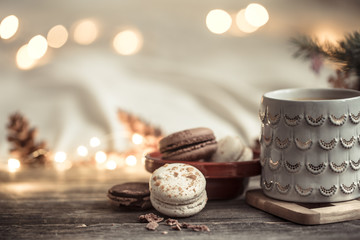 Festive background with Cup and dessert of macaroon.