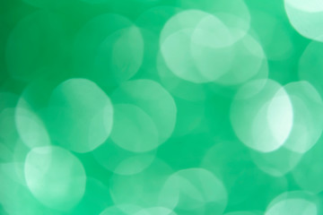 Abstract circular green bokeh background.