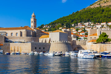 Fototapeta na wymiar Dominican monastery, defensive walls and the port of Dubrovnik, Croatia