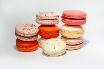 Colorful macaroni cakes on white background. Dessert