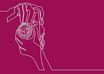 Vector Illustration of Hand Holding a Digital Camera- continuous line drawing