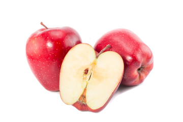 Red chief apples with a cut slice isolated on white background