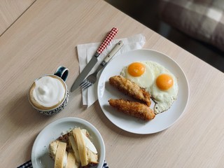 breakfast with coffee and fried eggs
