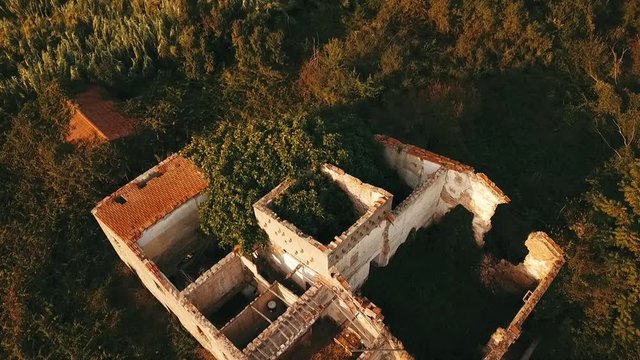 Aerial: Ruins of farmers house in picturuesque countryside in south Germany