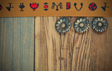 vintage brown band with embroidered ornaments and old buttons