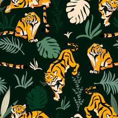  tigers in green grass