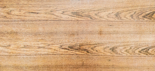 Fototapeta premium Brown colored wooden plank blocks for surface coverage with rough texture and recognizable natural wood pattern