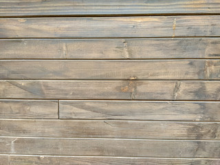 Retro looking small wooden planks as interesting natural material background wallpaper for flooring in rough texture
