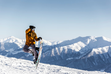 Snowboarder enjoying winter vacation.