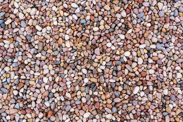 assorted colorful and smooth pebbles from the beach