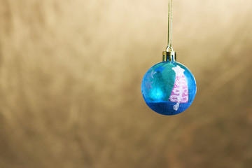 Christmas ball on golden background, merry christmas, happy new year